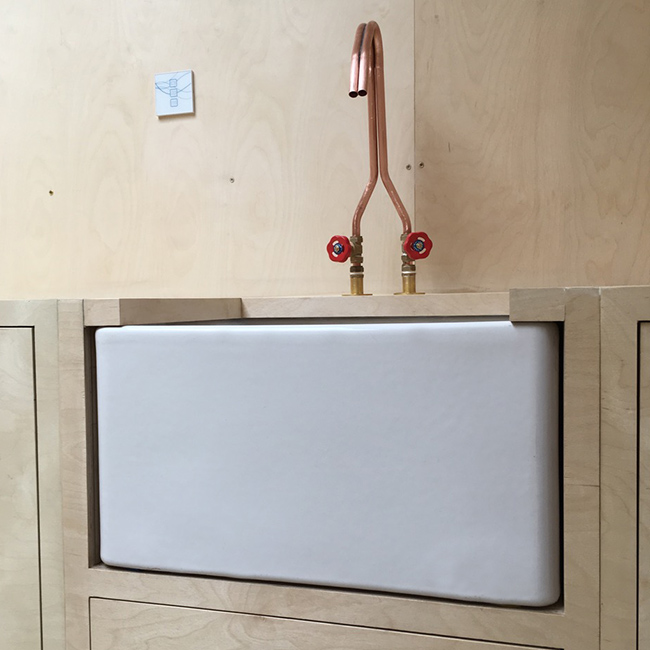 butler sink and copper tap in the garden studio