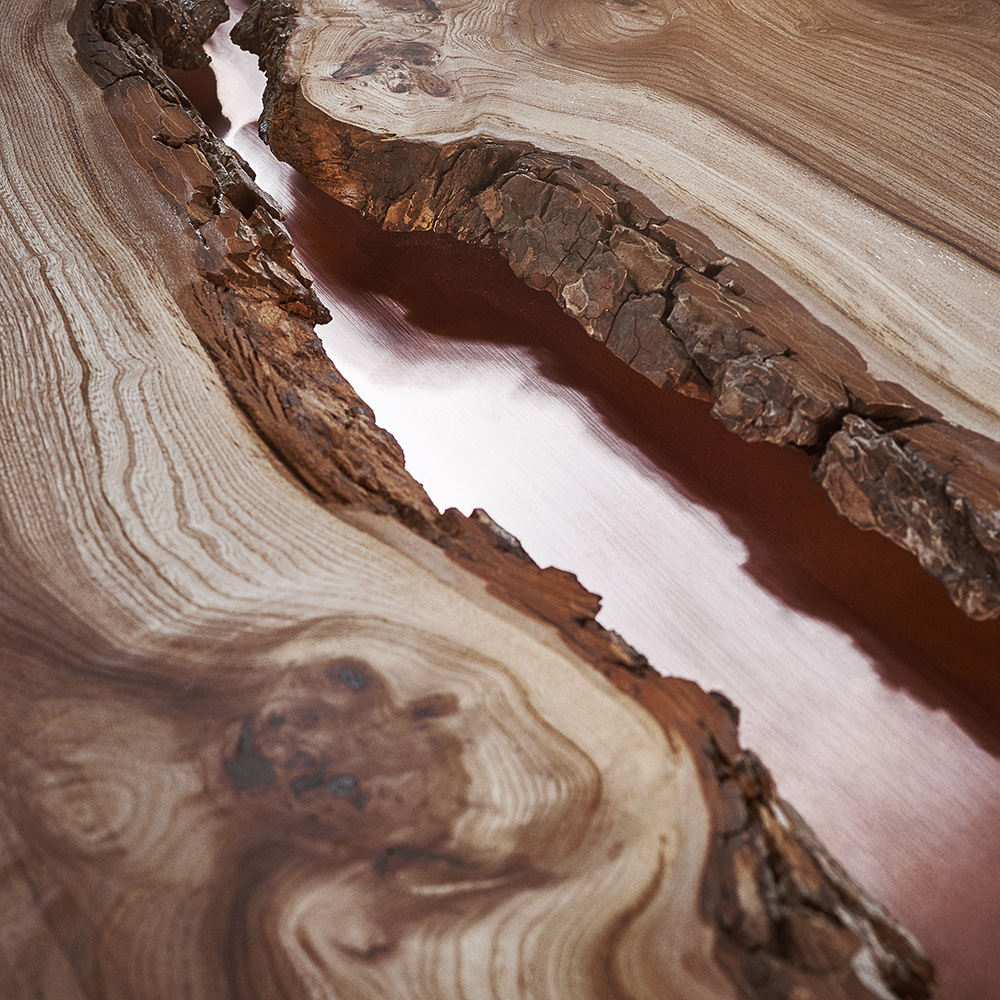 close up view of the live edge table and copper centre