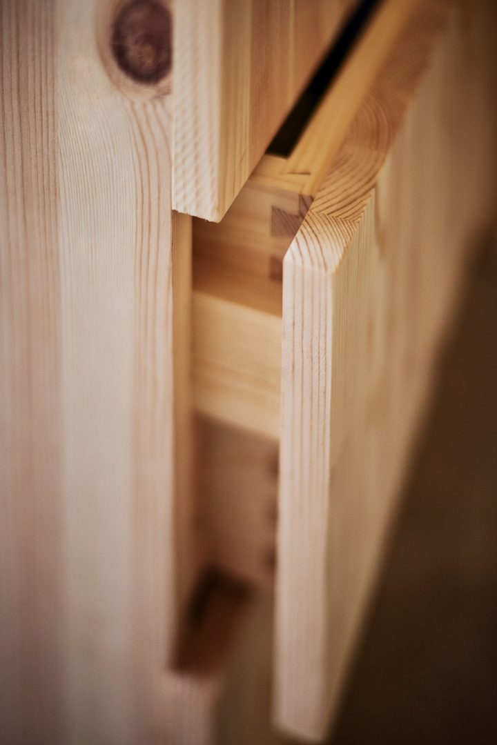 close up view of the pine drawer on the children's house beds
