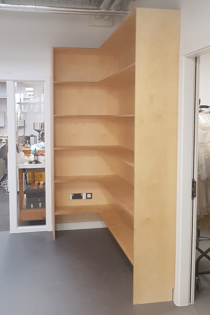 Birch Ply full height corner shelves as part of a joinery package for the English National Ballet