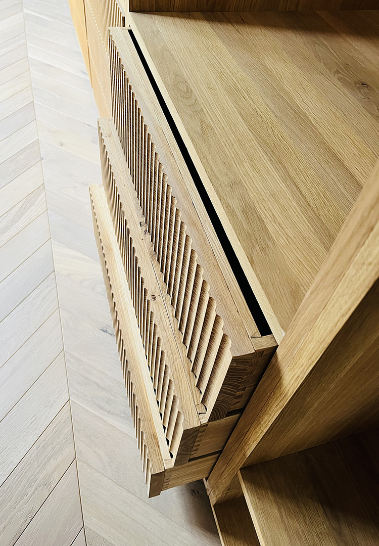 fluted dovetail oak drawers at the bottom of the walk in wardrobe