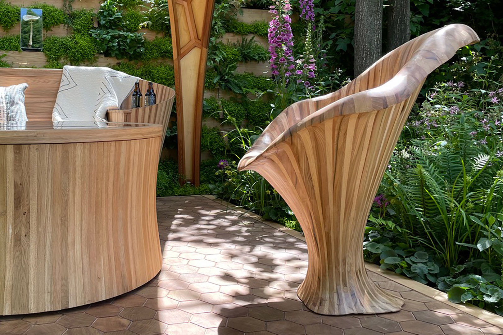 In situ view of the chanterelle mushroom chair from the Meta garden, RHS Chelsea Flower show