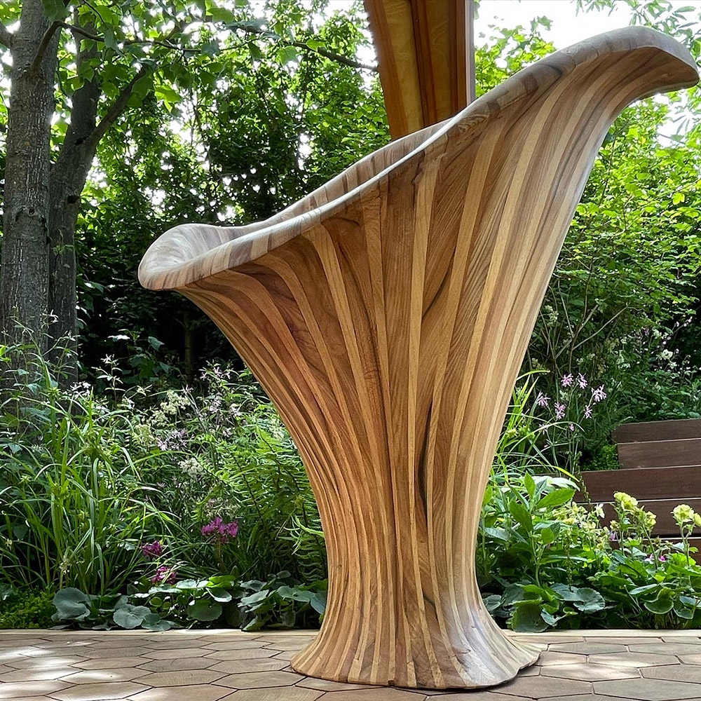 Side view of the chanterelle mushroom chair from the Meta garden, RHS Chelsea Flower show