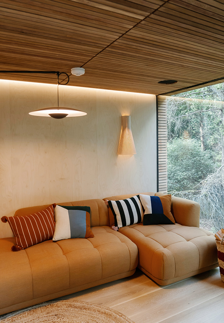Modern sand coloured corner sofa in the looking glass lodge