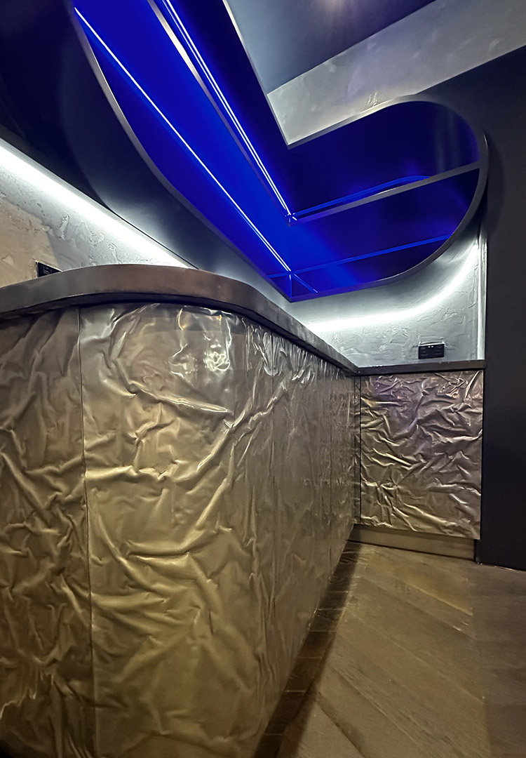 close up view of the liquid metal bar cabinetry in the executive box emirates