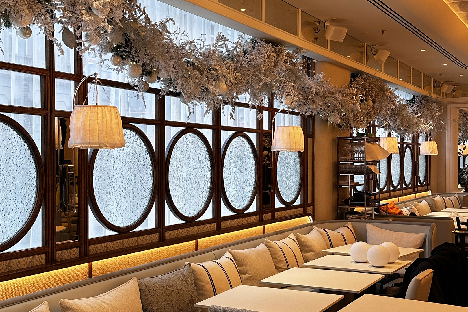 Restaurant view of Gaia London, showing the seating area and glazed joinery screens 
